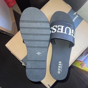 A pair of GUESS slides BRAND new never worn